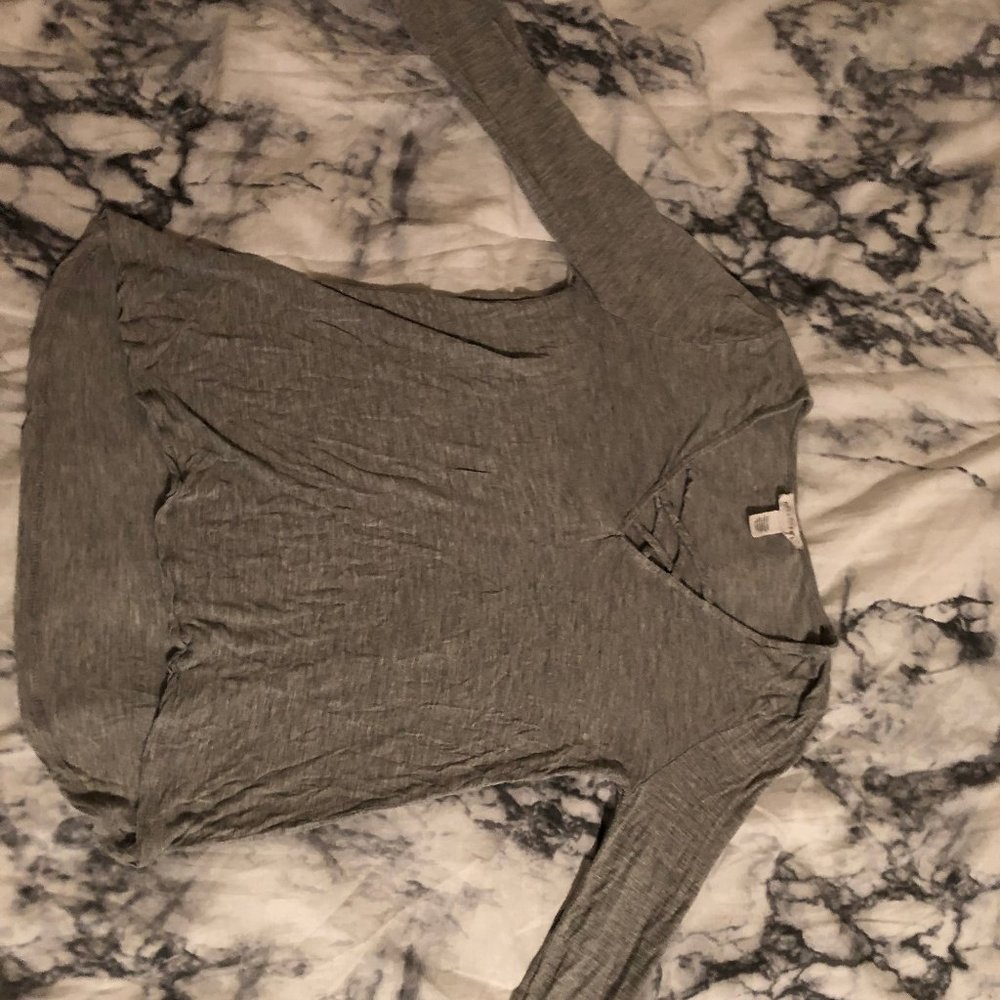 A juniors/womens long sleeve gray top